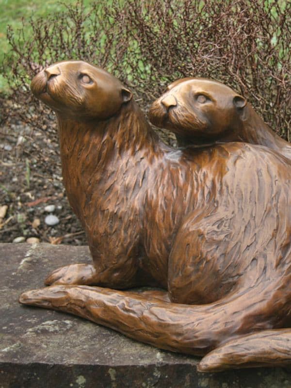 Bronze sculpture: River Otters by Georgia Gerber